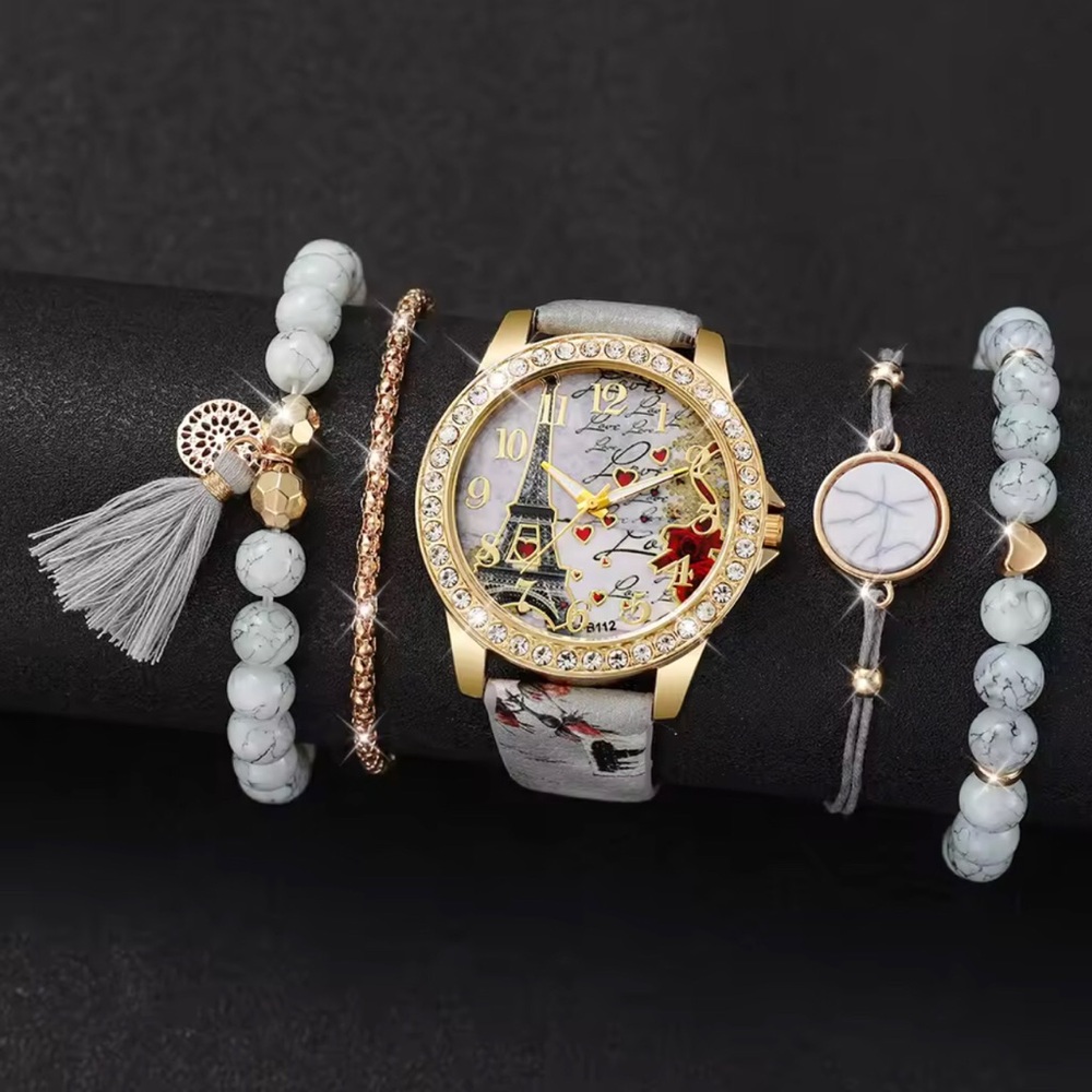 Gold and White Watch with Eiffel Tower Design